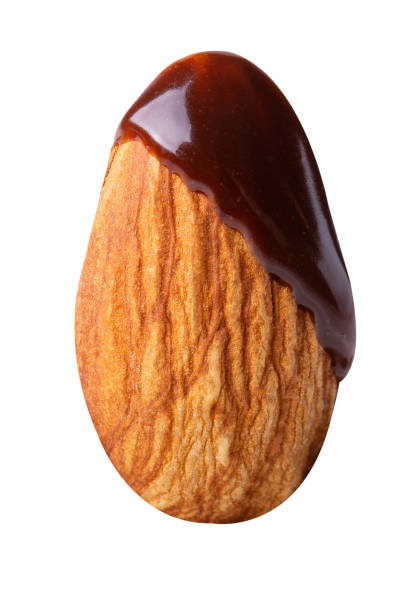 istock almond chocolate blast fly chocolate nuts isolated on white isolated 1292759009