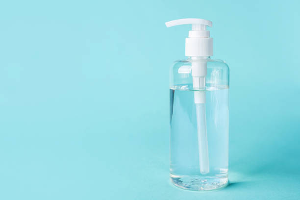 istock bottle alcohol clean with sanitiser liquid bottle . concenpt protection sanitiser tool protect corona virus on  turqouise isolated background 1292759190
