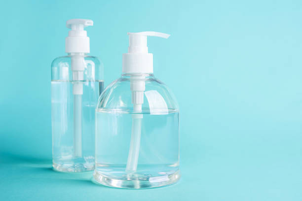 istock bottle alcohol clean with sanitiser liquid bottle . concenpt protection sanitiser tool protect corona virus on  turqouise isolated background 1292759195