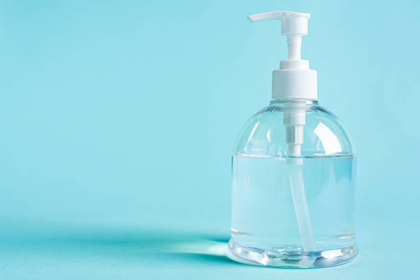 istock bottle alcohol clean with sanitiser liquid bottle . concenpt protection sanitiser tool protect corona virus on  turqouise isolated background 1292759199