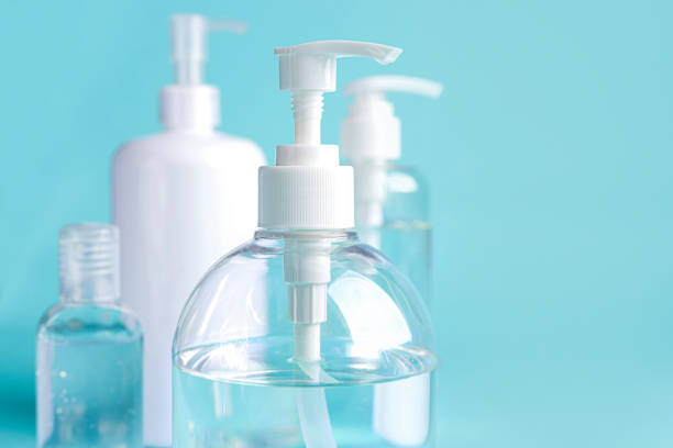 istock close up bottle alcohol clean with sanitiser liquid bottle . concenpt protection sanitiser tool protect corona virus on  turqouise isolated background 1292759210