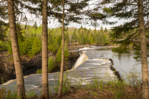 istock View through the trees of waterfall Kakabeka Falls. 1292759427