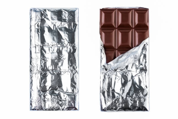 istock chocolate bar pieces Clipping Path on white isolated .Image stack Full depth of field macro 1292760191
