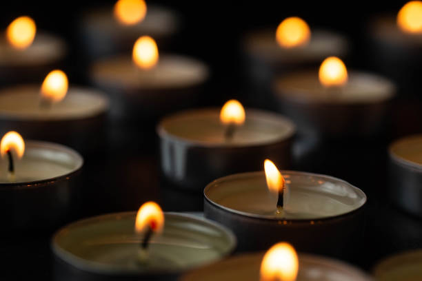 istock Christmas candles burning in the night. 1292763087