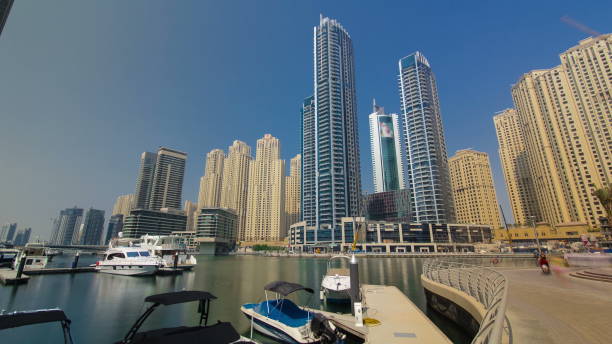 istock Dubai Marina skyscrapers. View from embankment timelapse 1292763119