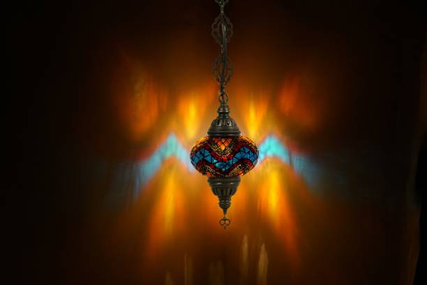 istock handmade mosaic lamp and reflection of pattern on background 1292763176