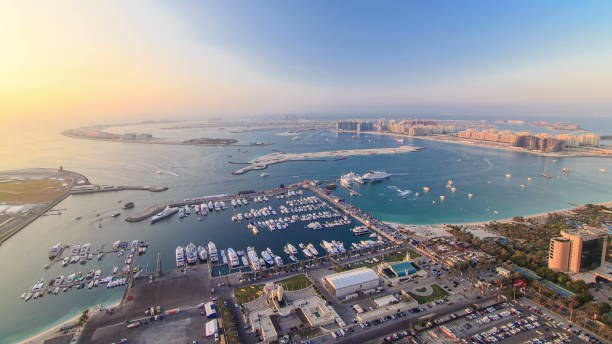 istock Dubai Marina wide angle Panorama evening time at sunset timelapse 1292764272