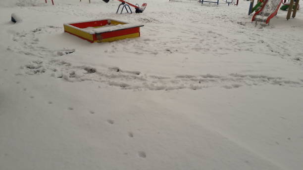 istock Snow-covered small architectural forms in the a playground 1292764914
