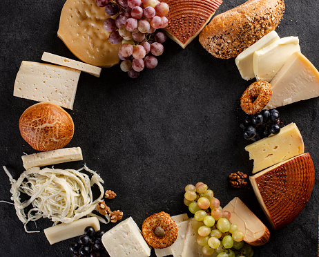 Various types of cheese with empty space background
