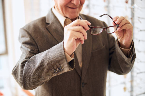 istock Man with his prescription eyewear standing indoors 1292767043