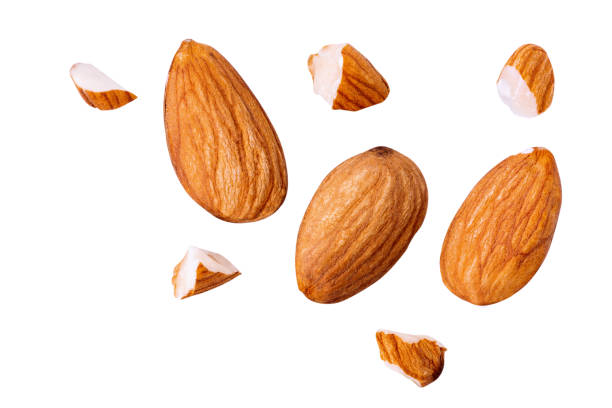 istock natural raw almond Float broke on white isolated 1292770078