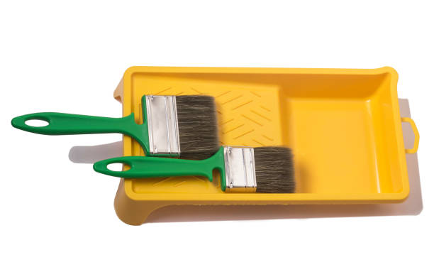 istock A set of painting tools. Paint brushes and tray 1292771322