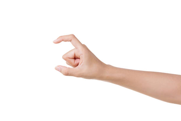 istock Female manicured hand measuring invisible items, woman's palm making gesture while showing small amount of something on white isolated background, side view, close-up, cutout, copy space 1292773908