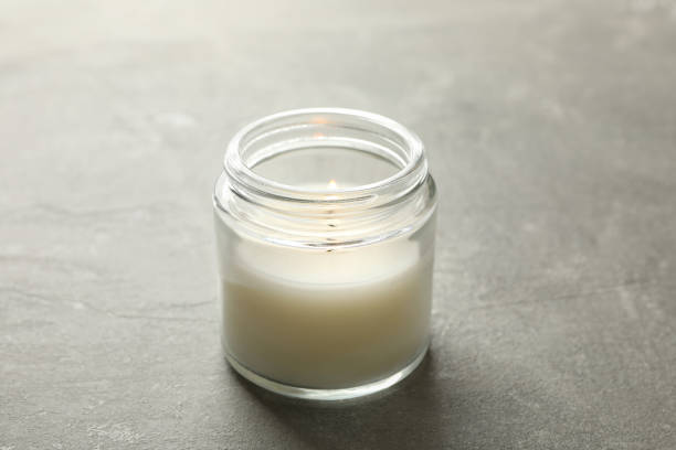 istock Scented candle for relax on gray background 1292775582