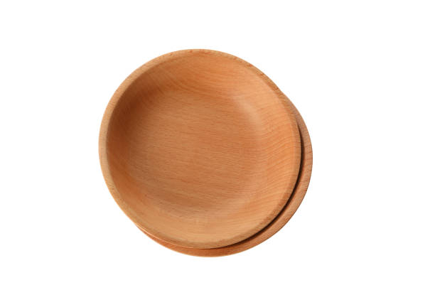 istock Two wooden bowls isolated on white background 1292781891