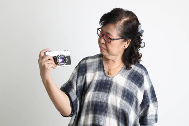 asijská žena - štětkotvaré fotky - stock snímky, obrázky a fotky