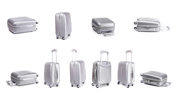 Travel suitcase isolated. Set of silver plastic luggage or vacation baggage bag on white background. Design of summer vacation holiday concept