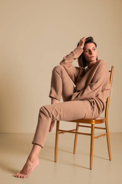 istock Fashion model posing in studio 1292785766