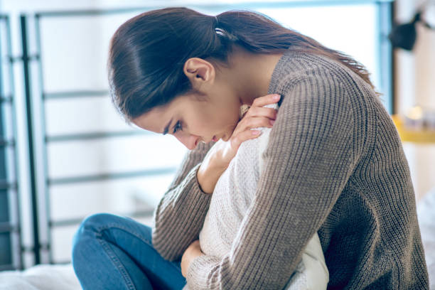 istock Dark-haired young woman looking stressed and frustrated 1292786655