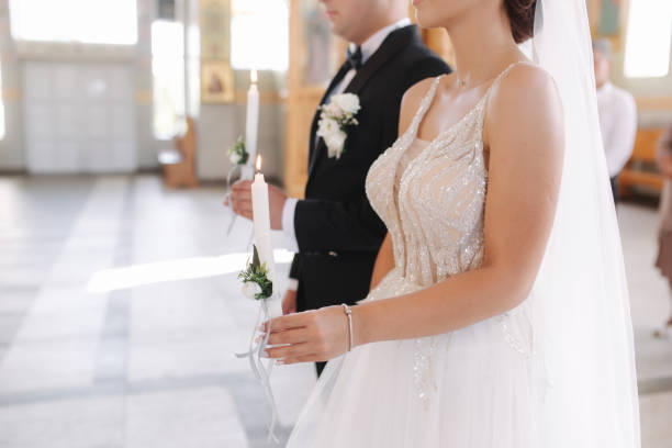 istock Groom and bride in church on wedding ceremony 1292786882