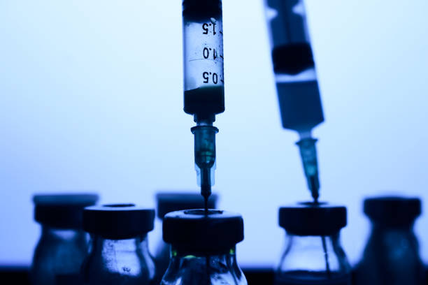 istock Close-up Injector and vaccine tubes 1292788798