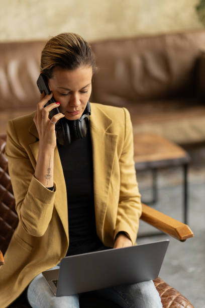 istock Young Caucasian businesswoman using a laptop 1292789116