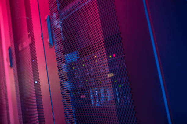 istock Server cabinet in dark isolated room with lighting 1292790183