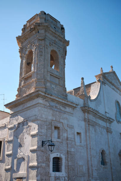 View of San Salvatore church in Monopoli Monopoli, Italy - September 04, 2020 : View of San Salvatore church monopoli puglia stock pictures, royalty-free photos & images