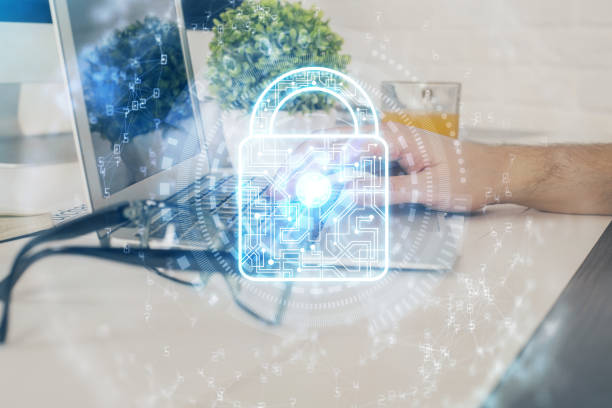 istock Multi exposure of lock icon with man working on computer on background. Concept of network protection. 1292792922
