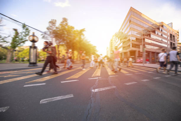 istock people crossing the street 1292793771