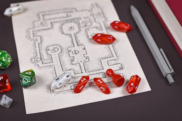 istock Roleplaying game dices on hand drawn dungeon adventure map. Concept for table top role playing games 1292795176