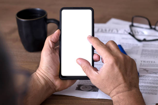 istock searching on yellow pages mobil application with smartphone 1292795868