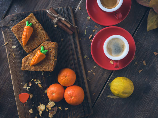 Carrot cake, espresso wood background
