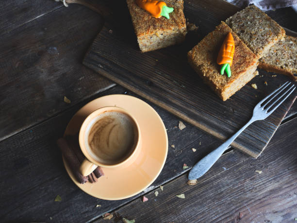Carrot cake, espresso wood background