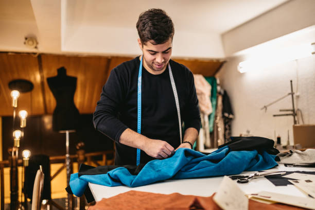 istock Fashion designer working in atelier 1292797168