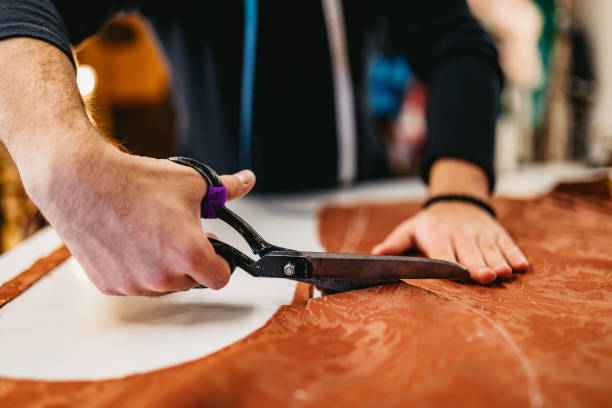istock Male fashion designer working in workshop 1292797227