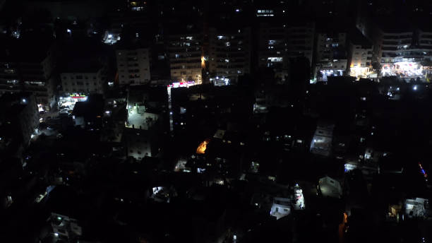 istock Palestinian town at night aerial view 1292798883