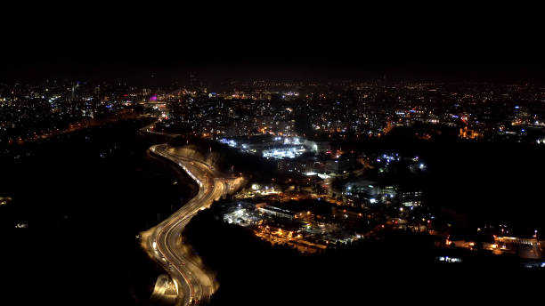 istock Jerusalem Main entrance highway 1 at night, Aerial view 1292798920