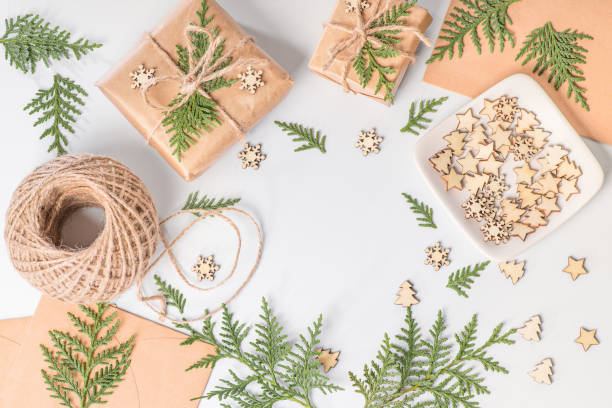 istock Christmas composition. Christmas fir tree branches, gifts on white background. Flat lay, top view. Copy space. Banner backdrop. 1292802011