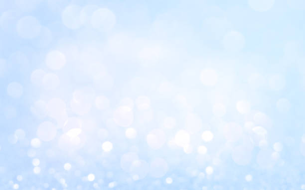 istock Violet glitter abstract background soft focus. Soft light. Abstract holiday background, beautiful shiny Christmas lights and winter snowflakes, glowing magic bokeh 1292803059