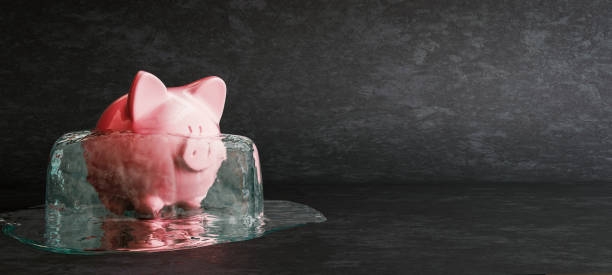 Defrosting piggy bank on black background, concept of unblocking frozen funds, close up, 3D Render stock photo