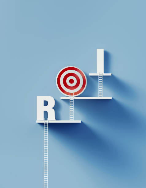 istock White Ladders Lean over A Bull's Eye Target and Write ROI on Blue Wall 1292808663