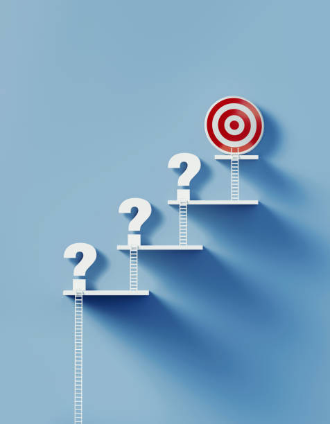 istock White Ladders and Question Marks Lean over A Bull's Eye Target on Blue Wall 1292808761