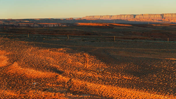 Rising Sunlight Creeping Across Desert Near Page, AZ