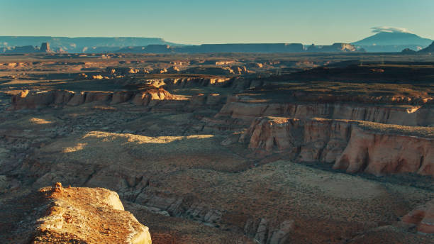 istock Sunlight and Shadow in on Arizona Desert Looking Towards LeChee Rock 1292808806