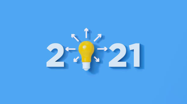 istock White Numbers and Yellow Lightbulb Write 2021 on Blue Background 1292809590