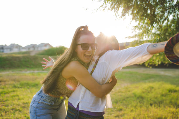 istock Female friends having fun outdoors on a lovely sunny day 1292810410