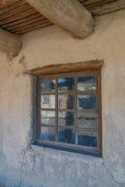 istock Adobe wall and window of old trading fort 1292813519