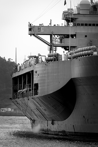 Yokosuka, Kanagawa / Japan - June 24, 2020: The USS Blue Ridge (LCC-19) returns to its homeport with sailors on its decks.