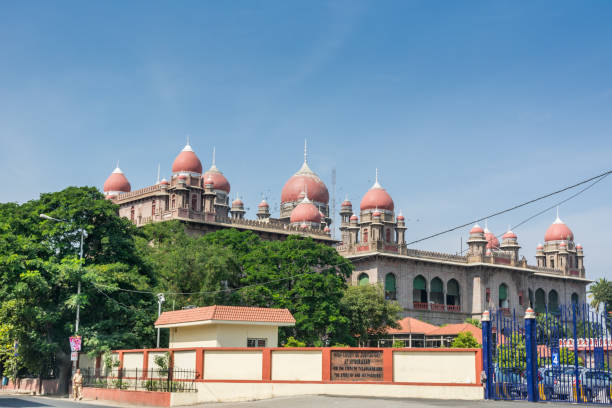 High Court for the State of Telangana at Hyderabad built with stone against blue sky of Hyderabad City, Andhra Pradesh,  India stock photo